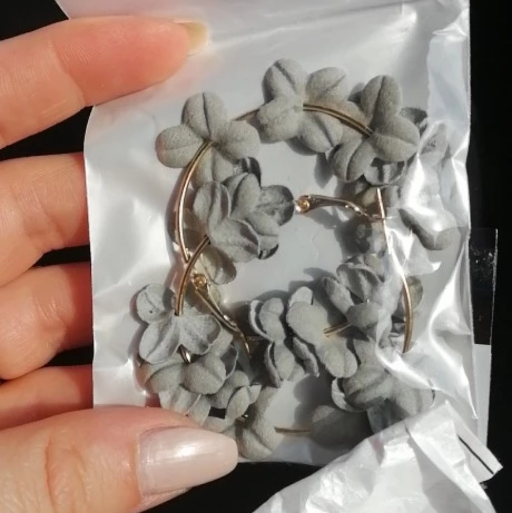 Gray fabric earrings.